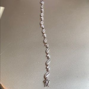 Silver bracket with rhinestones